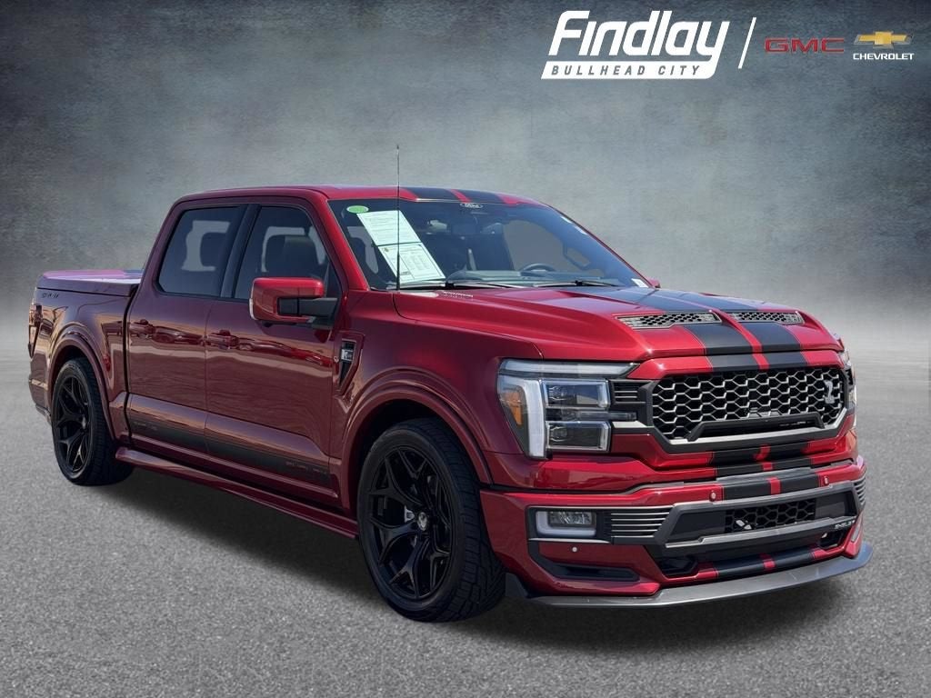 2024 Ford F-150 LARIAT in Red — front three-quarter view