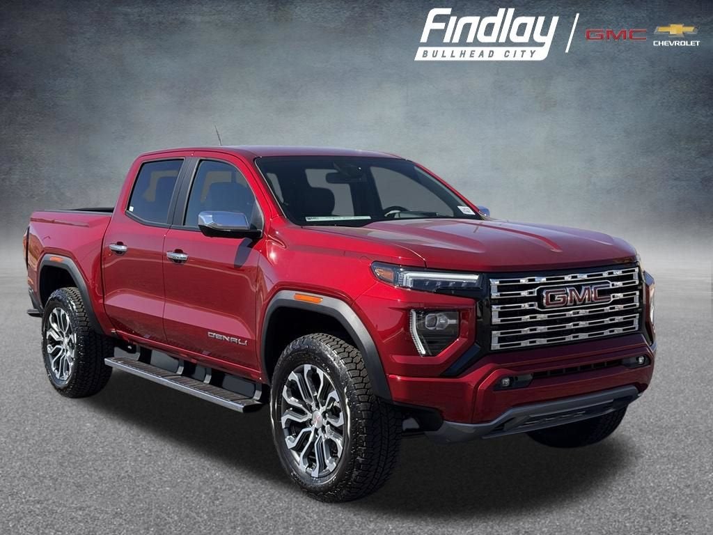 2026 GMC Canyon Denali in Volcanic Red Tintcoat — front three-quarter view