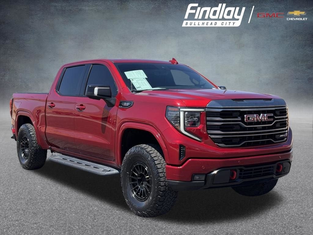 2024 GMC Sierra 1500 AT4 in Volcanic Red Tintcoat — front three-quarter view