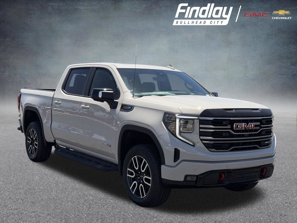 2026 GMC Sierra 1500 AT4 in Coastal Dune — front three-quarter view