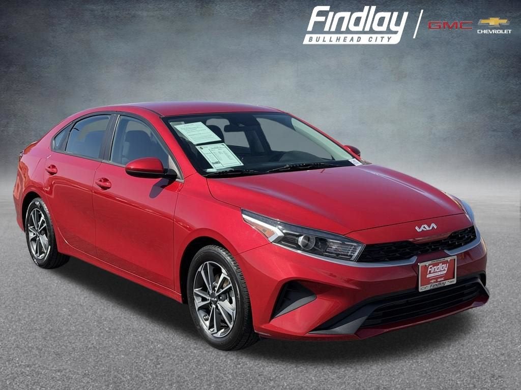 2024 Kia Forte LXS in Red — front three-quarter view