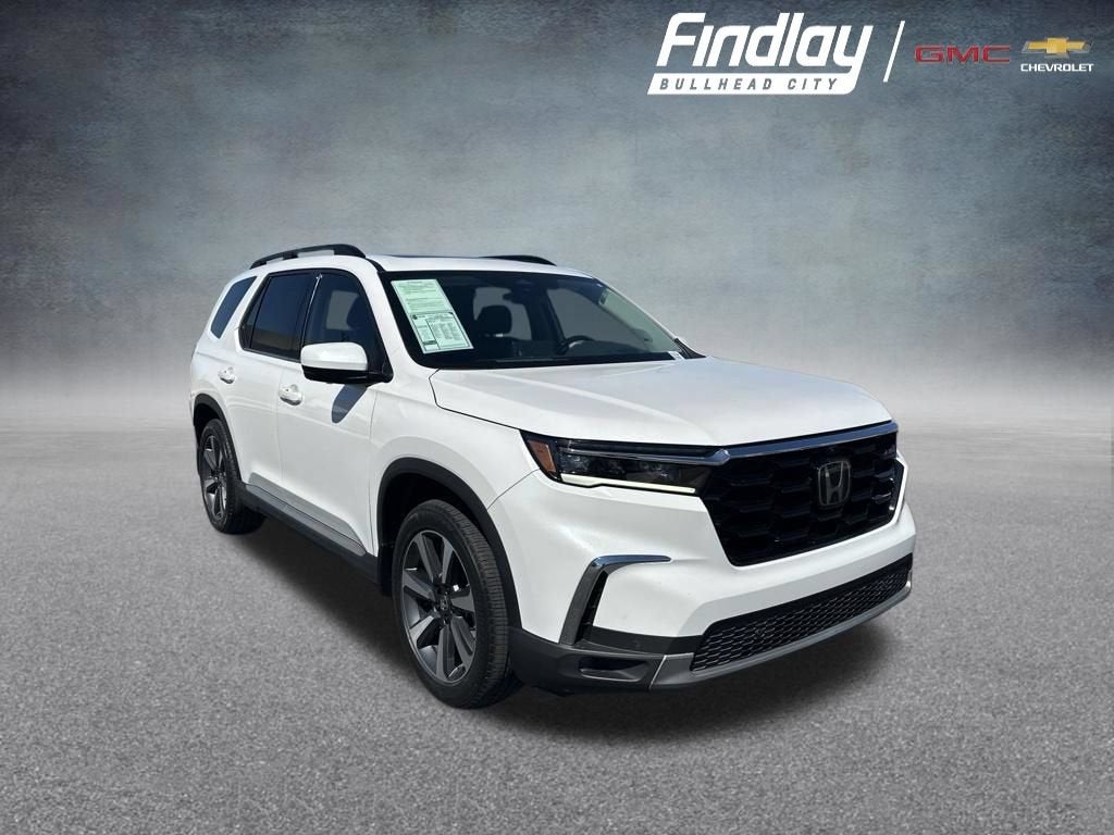2024 Honda Pilot Elite in White — front three-quarter view